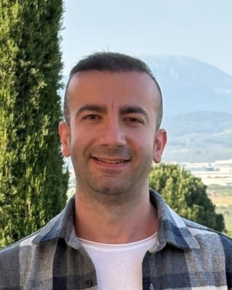 Enes Ataç headshot